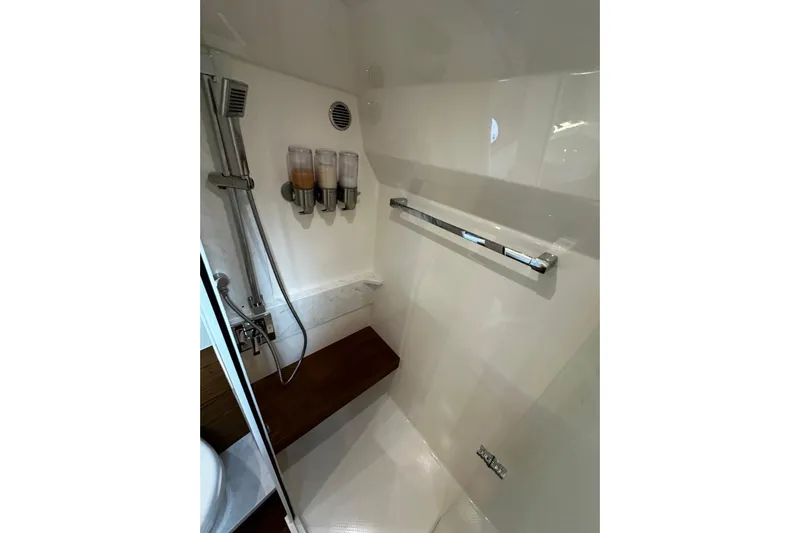  Yacht Photos Pics Shower area in 2022 Tiara Yachts C39 Coupe with modern fixtures and dispensers.