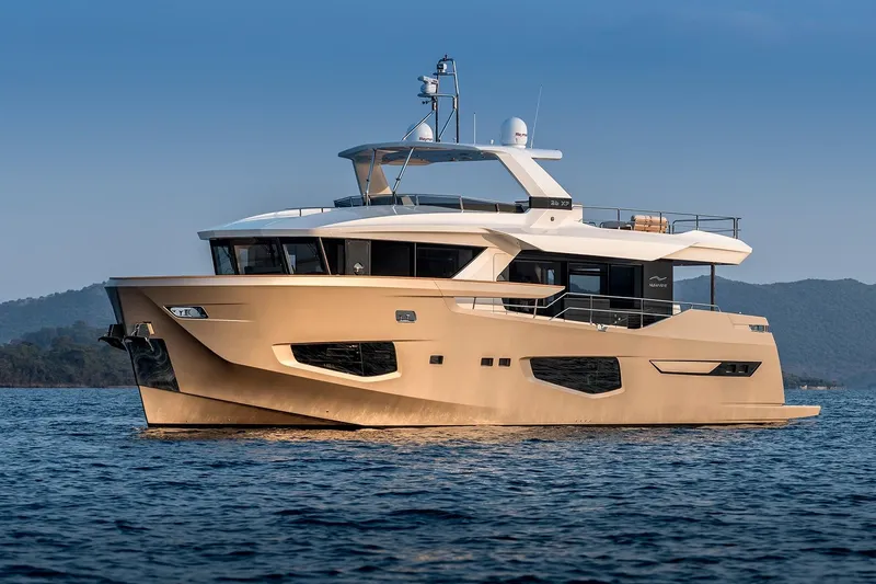 Numarine 26xp Yacht Photos Pics Luxurious 2025 Numarine 26XP yacht cruising on serene waters.