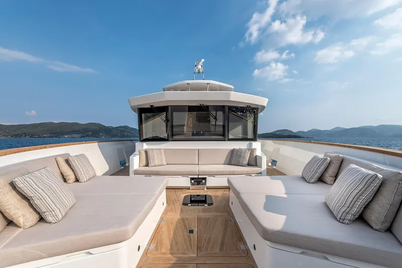Numarine 26xp Yacht Photos Pics Luxurious 2025 Numarine 26XP yacht deck with plush seating and scenic ocean view.