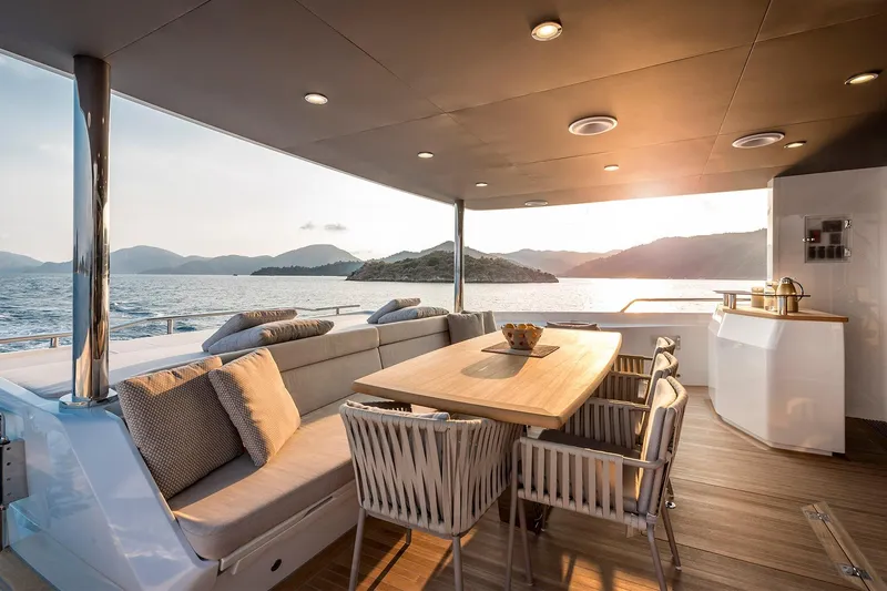 Numarine 26xp Yacht Photos Pics Luxurious 2025 Numarine 26XP yacht interior with elegant dining area and scenic ocean view.