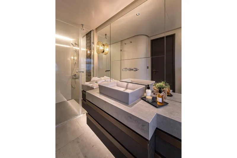 Numarine 26xp Yacht Photos Pics Luxurious bathroom in 2025 Numarine 26XP yacht with modern sink and glass shower.