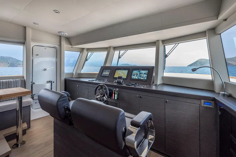 Numarine 26xp Yacht Photos Pics Pilothouse of 2025 Numarine 26XP yacht with modern navigation equipment and sea view.