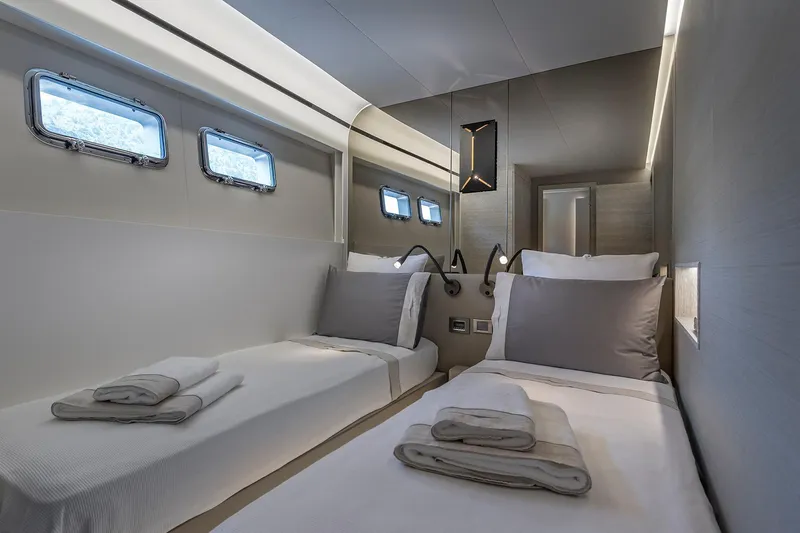 Numarine 26xp Yacht Photos Pics Luxurious 2025 Numarine 26XP yacht cabin with twin beds and modern design.