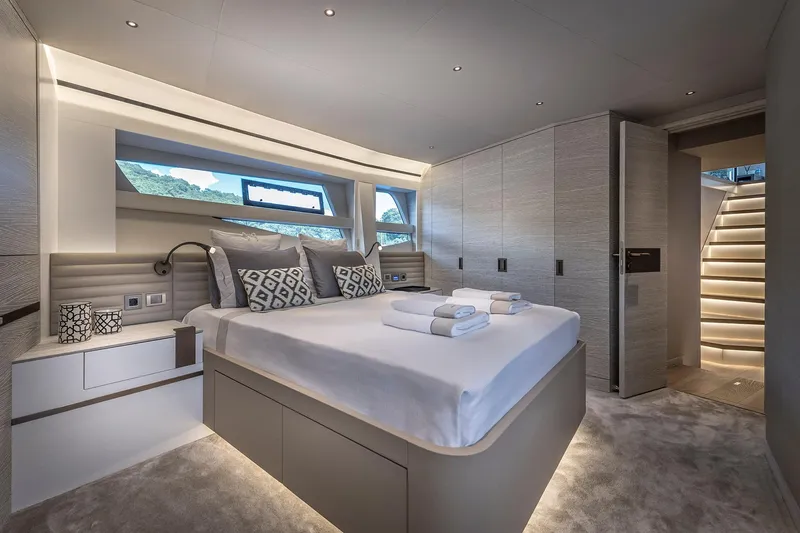 Numarine 26xp Yacht Photos Pics Luxurious bedroom interior of 2025 Numarine 26XP yacht, featuring modern design and ambient lighting.