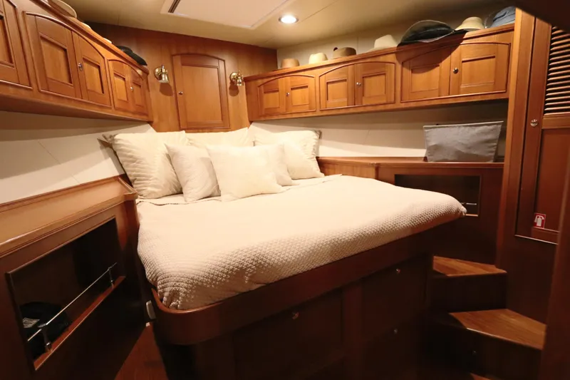Mi Cielo Yacht Photos Pics Luxurious cabin interior of 2017 Marlow Explorer 49E yacht with cozy bedding.