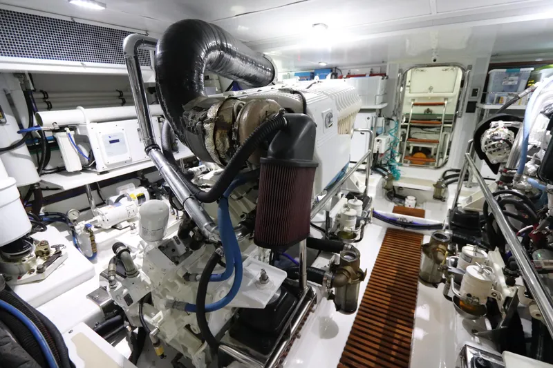 Mi Cielo Yacht Photos Pics Engine room of 2017 Marlow Explorer 49E yacht, showcasing machinery and equipment.