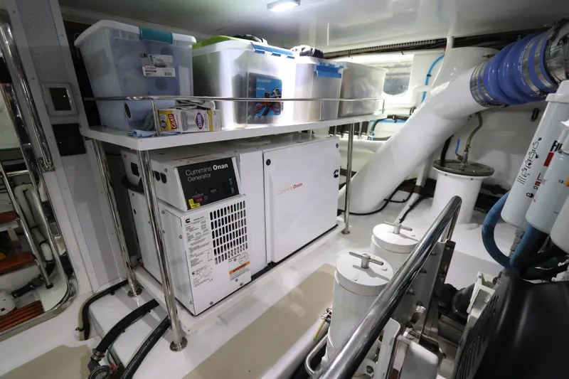 Mi Cielo Yacht Photos Pics Engine room of 2017 Marlow Explorer 49E with organized storage and equipment.