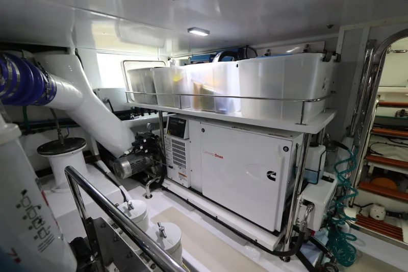 Mi Cielo Yacht Photos Pics Engine room of 2017 Marlow Explorer 49E yacht, featuring Cummins generator and equipment.