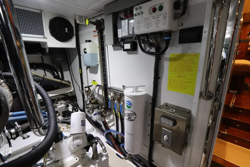 Mi Cielo Yacht Photos Pics Engine room of 2017 Marlow Explorer 49E yacht, showcasing mechanical systems and components.