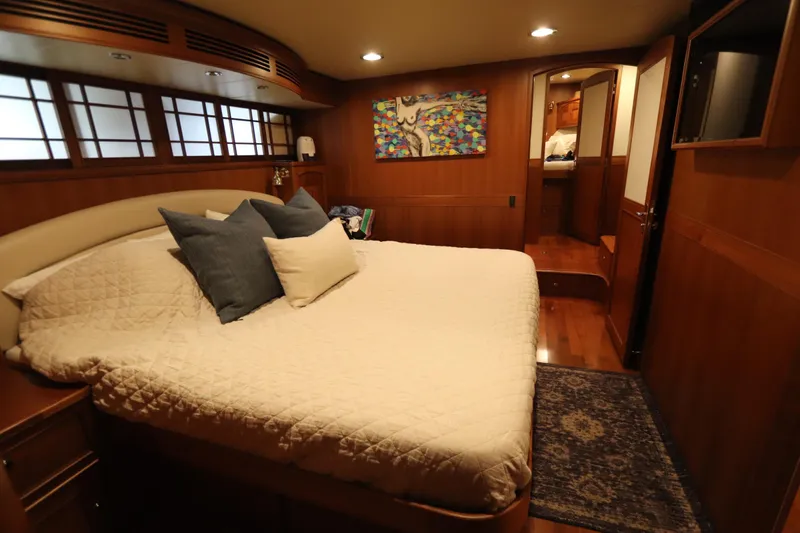 Mi Cielo Yacht Photos Pics Luxurious cabin interior of 2017 Marlow Explorer 49E yacht with cozy bedding.