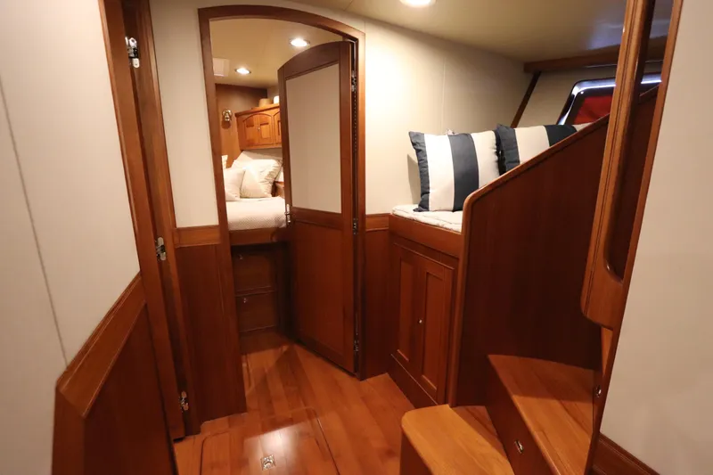 Mi Cielo Yacht Photos Pics 2017 Marlow Explorer 49E interior with wooden stairs and cozy cabin.