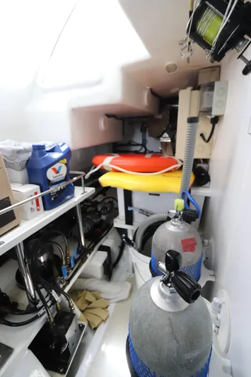 Mi Cielo Yacht Photos Pics Interior of 2017 Marlow Explorer 49E yacht with diving equipment and storage.