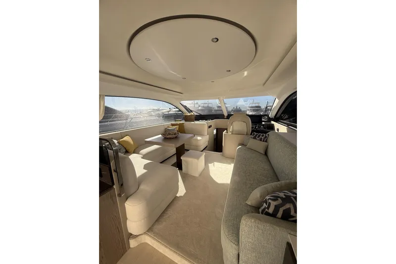 Yacht Photos Pics Luxurious interior of 2024 Azimut 53 Fly yacht with elegant seating and modern design.