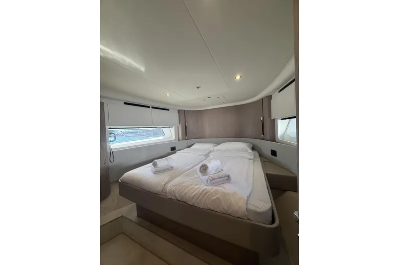  Yacht Photos Pics Luxurious bedroom interior of 2024 Azimut 53 Fly yacht with modern design.