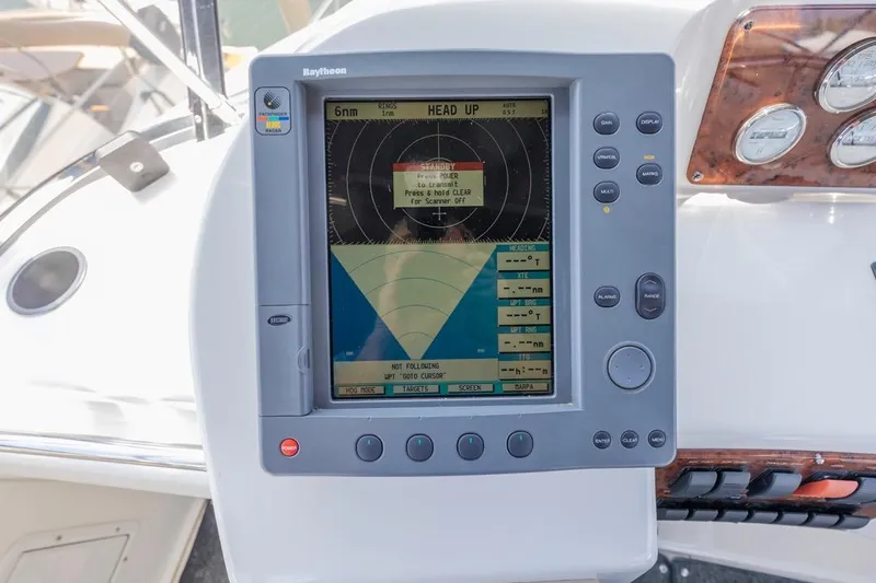 Just Joyce Yacht Photos Pics Raytheon marine navigation system on 2000 Silverton 435 yacht dashboard.