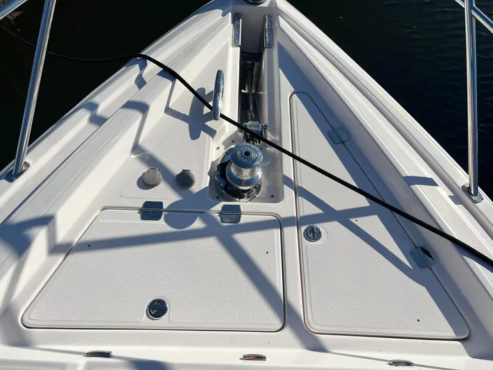 Day Off Yacht Photos Pics Bow of 2015 Regal 53 Sport Coupe yacht with anchor and deck details.