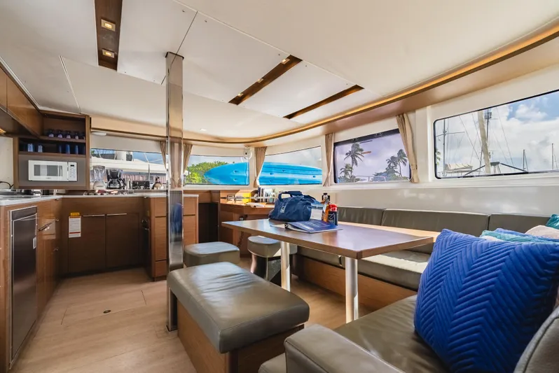As You Wish Yacht Photos Pics Interior of 2020 Lagoon 46 catamaran with modern kitchen and dining area.