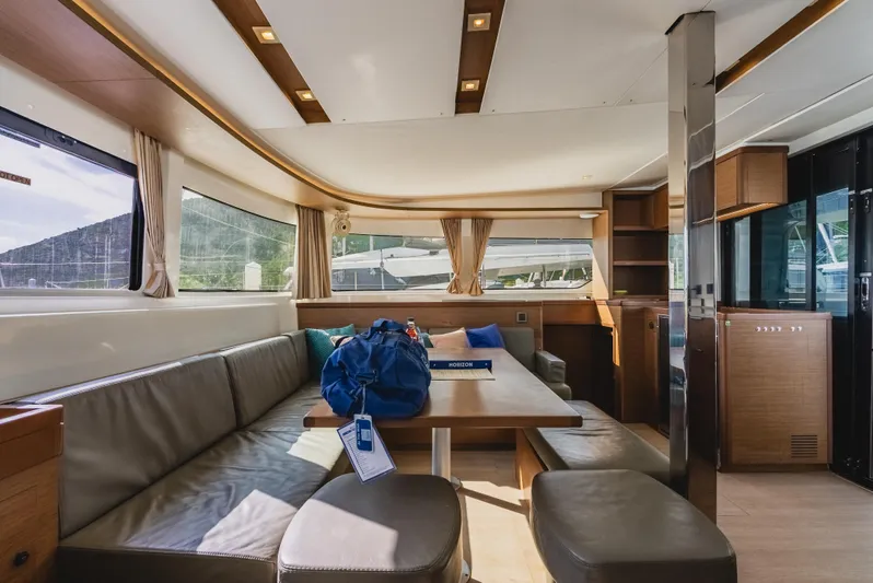 As You Wish Yacht Photos Pics Luxurious interior of 2020 Lagoon 46 catamaran with spacious seating and modern design.