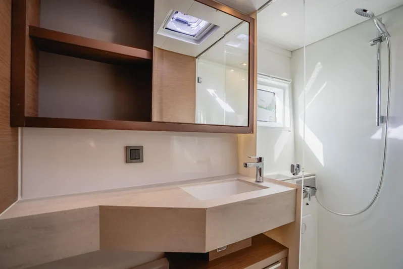 As You Wish Yacht Photos Pics Modern bathroom in 2020 Lagoon 46 yacht with sleek sink and shower.