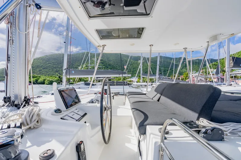 As You Wish Yacht Photos Pics Luxurious 2020 Lagoon 46 yacht cockpit with scenic mountain view.