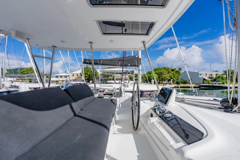 As You Wish Yacht Photos Pics Lagoon 46 catamaran cockpit, 2020 model, featuring sleek design and modern navigation equipment.