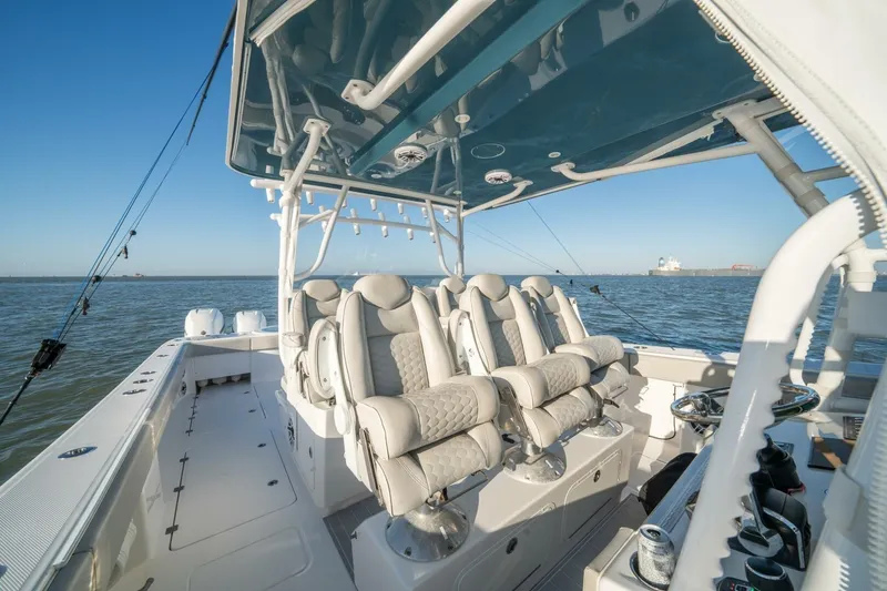 Catallac Yacht Photos Pics 2023 Invincible 46 Catamaran interior with luxurious seating on open water.