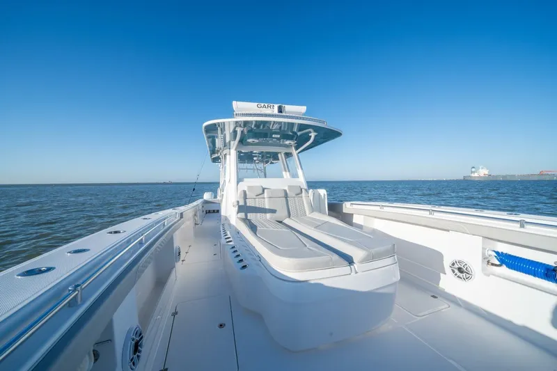 Catallac Yacht Photos Pics 2023 Invincible 46 Catamaran on open water, showcasing sleek design and spacious deck.