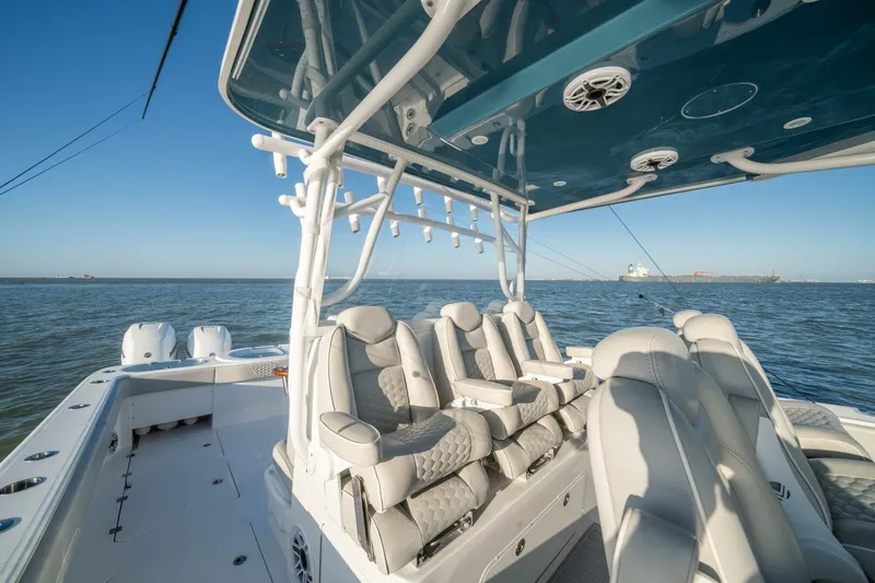 Catallac Yacht Photos Pics 2023 Invincible 46 Catamaran with luxurious seating on open water.