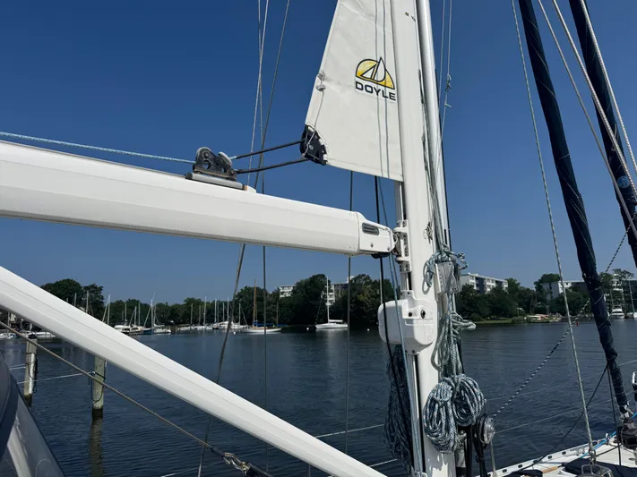Matilida Yacht Photos Pics Sailboat mast and rigging on a 2002 Hylas 46, docked by a calm marina.