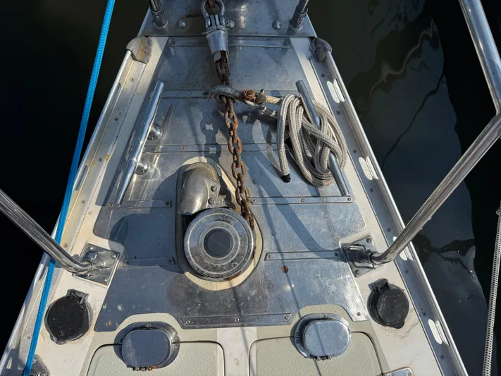 Matilida Yacht Photos Pics Bow of 2002 Hylas 46 sailboat with anchor chain and rope.