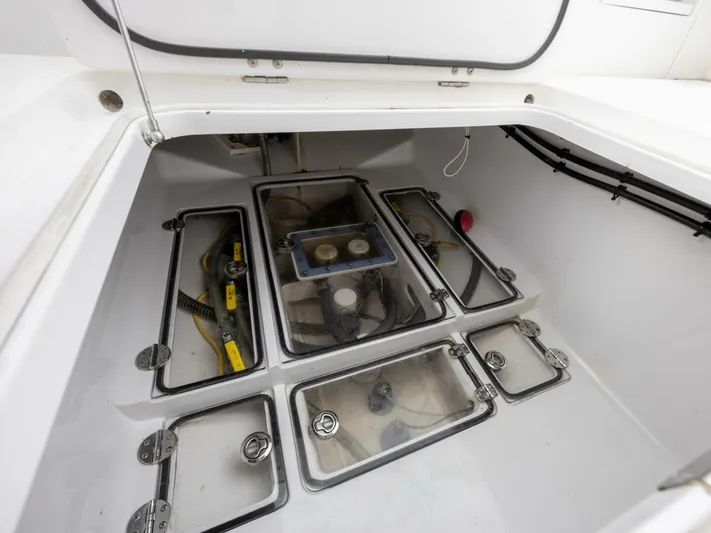 Bill Time Yacht Photos Pics Engine compartment of 2016 Bahama 41 boat with visible components and wiring.