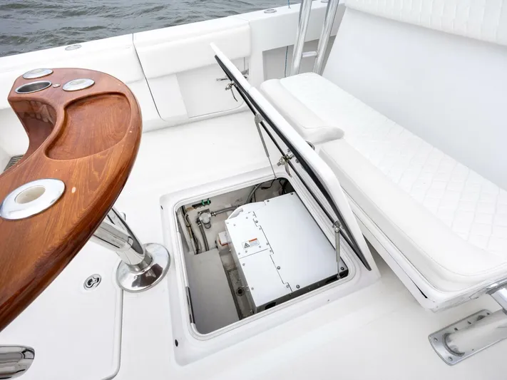 Bill Time Yacht Photos Pics 2016 Bahama 41 boat interior with open hatch and wooden table.