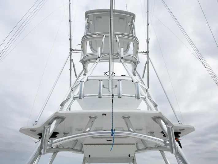 Bill Time Yacht Photos Pics 2016 Bahama 41 boat tower against cloudy sky.