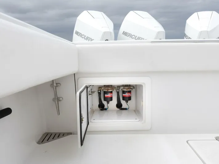 Bill Time Yacht Photos Pics Bahama 41 boat with Mercury engines, open compartment showing fuel filters, 2016 model.