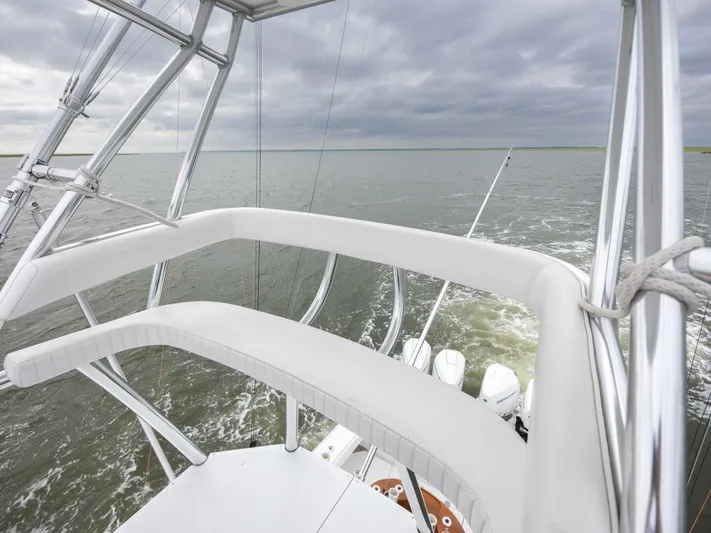 Bill Time Yacht Photos Pics 2016 Bahama 41 boat on open water under cloudy skies.