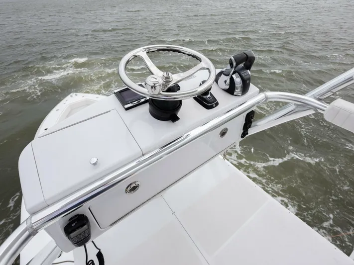 Bill Time Yacht Photos Pics 2016 Bahama 41 boat helm with steering wheel and controls on open water.