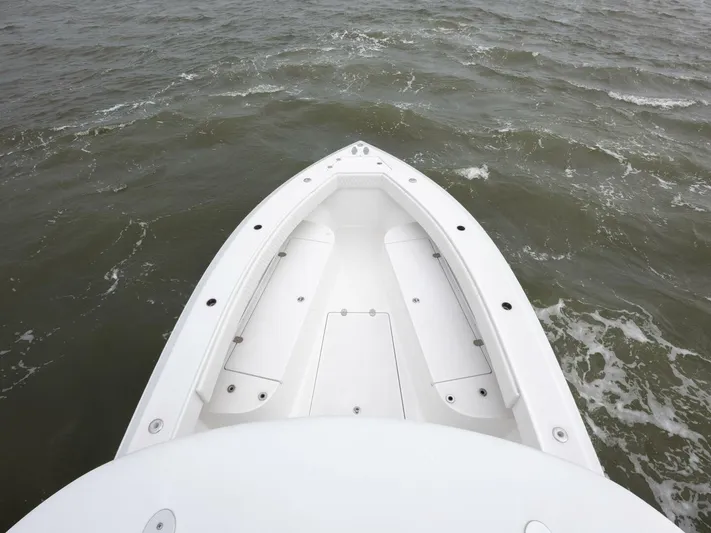 Bill Time Yacht Photos Pics Bow view of 2016 Bahama 41 boat on open water.