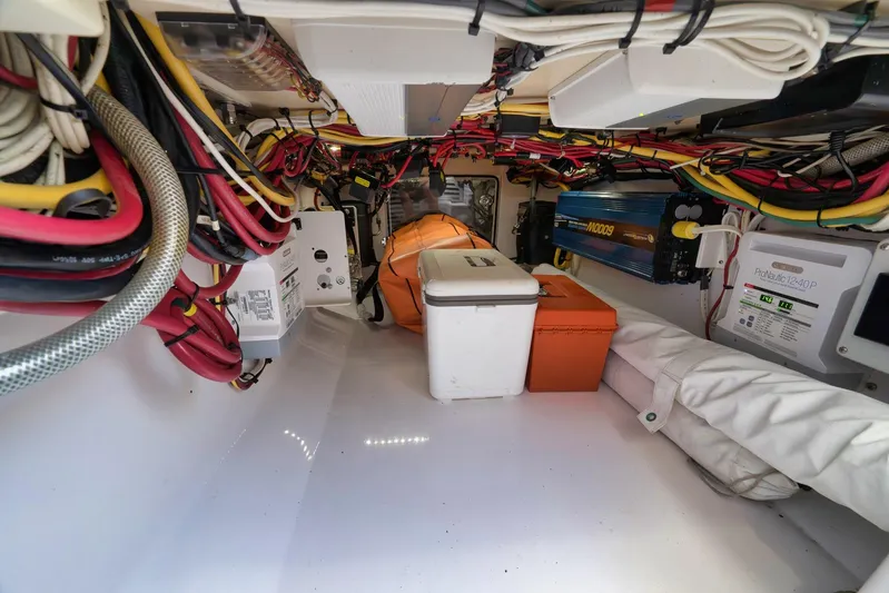 Bill Time Yacht Photos Pics Electrical compartment of a 2016 Bahama 41 boat with wiring and equipment.