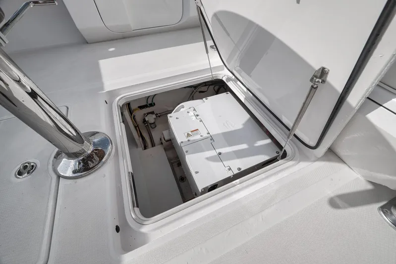 Bill Time Yacht Photos Pics Open hatch on 2016 Bahama 41 boat deck revealing storage compartment.