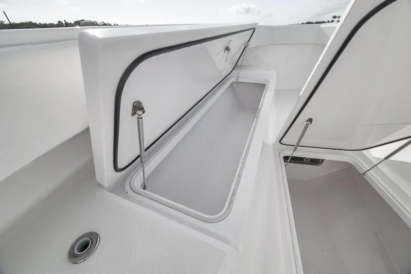 Bill Time Yacht Photos Pics Open storage compartments on a 2016 Bahama 41 boat deck.