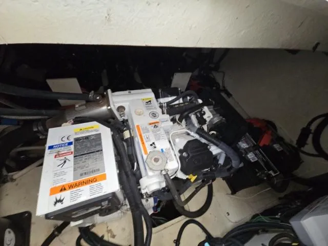  Yacht Photos Pics Engine compartment of 2017 Sea Ray Sundancer 350 Coupe with visible machinery and wiring.