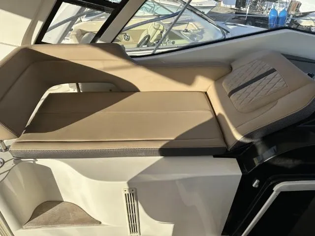  Yacht Photos Pics 2017 Sea Ray Sundancer 350 Coupe interior with beige seating and modern design.