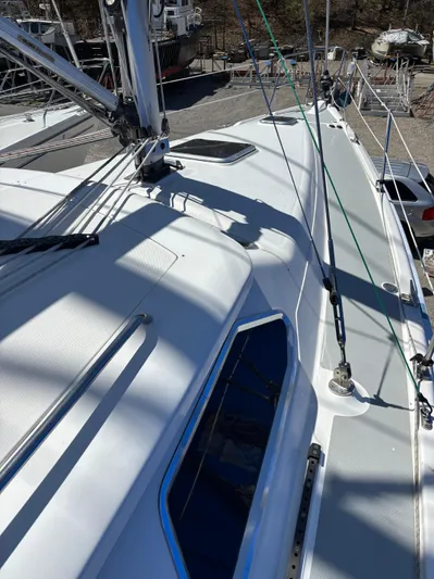 Lucky Dog Too Yacht Photos Pics Deck view of a 2008 Hunter 41 DS sailboat, showcasing rigging and sleek design.
