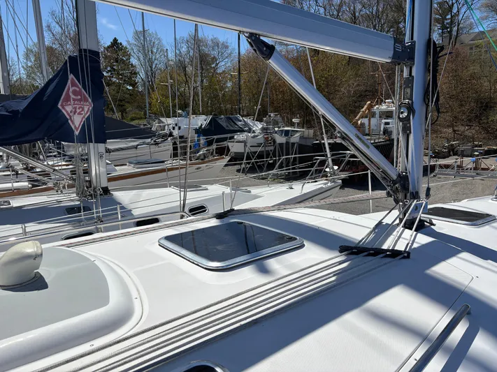 Lucky Dog Too Yacht Photos Pics Sailboat deck view of a 2008 Hunter 41 DS in a marina setting.