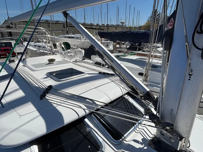 Lucky Dog Too Yacht Photos Pics Sailboat deck of 2008 Hunter 41 DS with rigging and hatches in marina setting.