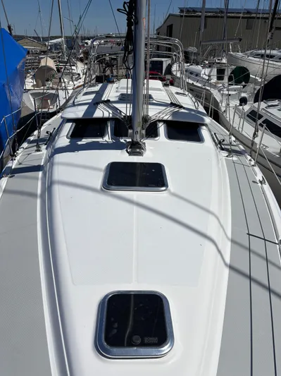 Lucky Dog Too Yacht Photos Pics 2008 Hunter 41 DS sailboat deck view with hatches and rigging in marina.