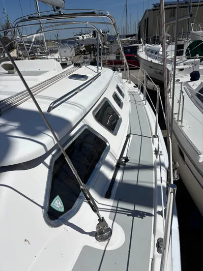 Lucky Dog Too Yacht Photos Pics 2008 Hunter 41 DS sailboat docked, showcasing sleek deck design and modern features.