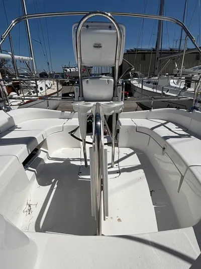 Lucky Dog Too Yacht Photos Pics Cockpit of 2008 Hunter 41 DS sailboat with steering wheel and seating.