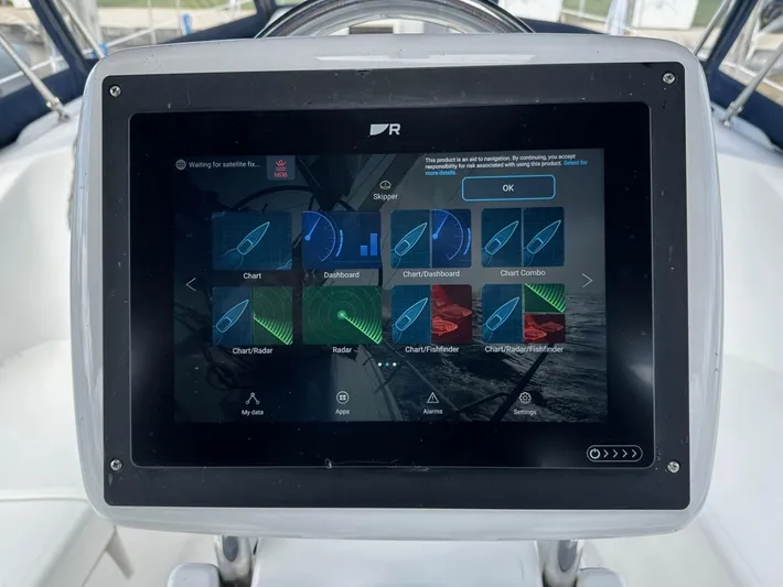 Lucky Dog Too Yacht Photos Pics Touchscreen navigation display on a 2008 Hunter 41 DS sailboat, showing various chart options.