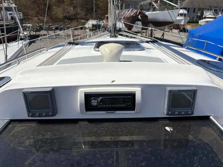 Lucky Dog Too Yacht Photos Pics 2008 Hunter 41 DS yacht dashboard with navigation instruments and stereo system.